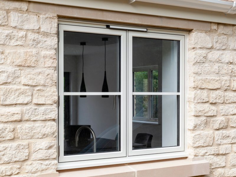 What is a flush sash window?